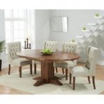 Torino Dark Solid Oak Extending Pedestal Dining Table with Safia Fabric Dark Oak Leg Chairs